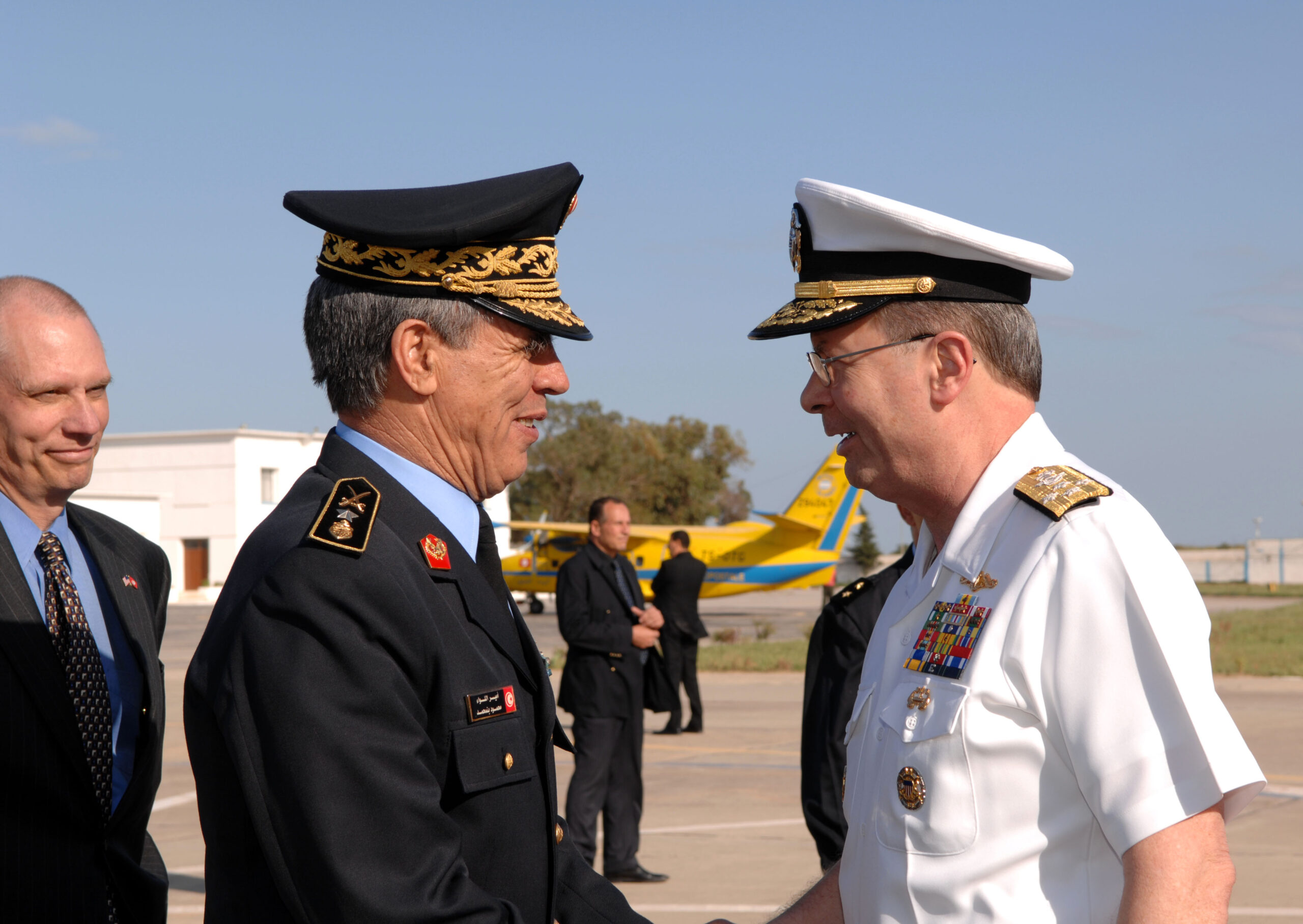Navy Adm. Edmund P. Giambastiani, vice chairman of the Joint Chiefs of Staff, meets Tunisian Rear Adm. Tarak EL Arbi, Tunisian Navy Chief of Staff, at the Carthage Aiport in Tunis May 4. Giambastiani visited the country to meet with senior officials about Tunisian and American cooperation. Defense Dept. photo by Air Force Tech. Sgt. Adam M. Stump. (CLEARED FOR PUBLIC RELEASE)